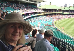 Jan at the cricket, binoculars ready.