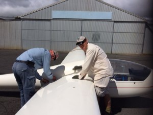 Clifford (left) and tuggie Paul help finish assembly of the Astir.